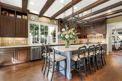 Welcome to this exquisite European Manor perfectly situated in