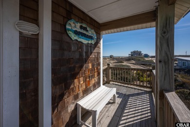Gull Cottage presents a rare opportunity to own a custom-built
