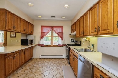 Nestled in a quiet, sought-after Huntington neighborhood, this - photo 27