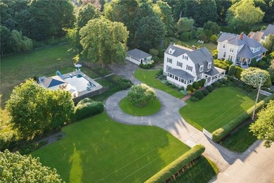 Set on 1.85 private acres along one of Warwick Neck's premier - photo 1