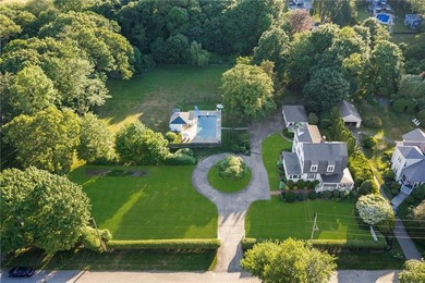 Set on 1.85 private acres along one of Warwick Neck's premier - photo 3