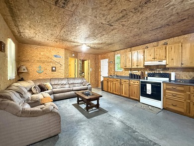 SECLUDED! Tucked away on 1.75 wooded acres, this cute 3-bedroom - photo 3