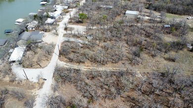 Tucked just steps away from the beautiful shores of Lake - photo 3