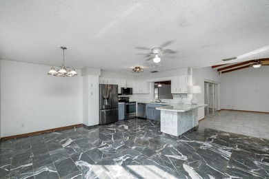 Beautiful three-bedroom, two bath home located in a charming - photo 8