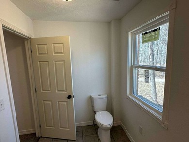 This cozy retreat features one bedroom, one bath, and a - photo 9