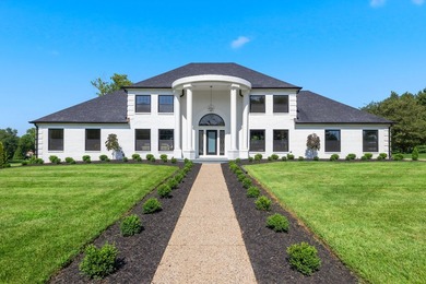 Welcome to this stunning, fully remodeled luxury home in the - photo 1
