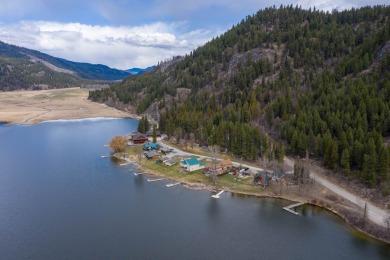 Escape to the serenity of Deep Lake Resort, nestled amidst 47 - Lake Acreage For Sale in Colville, Washington