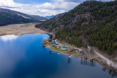 Escape to the serenity of Deep Lake Resort, nestled amidst 47 - Lake Commercial For Sale in Colville, Washington