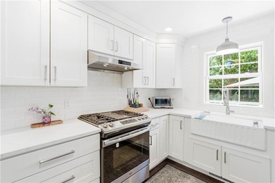 Beautifully updated 1947 Cape Cod set on a quiet cul-de-sac in - photo 5