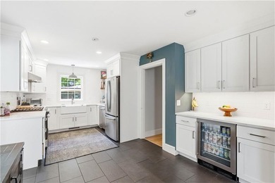 Beautifully updated 1947 Cape Cod set on a quiet cul-de-sac in - photo 7