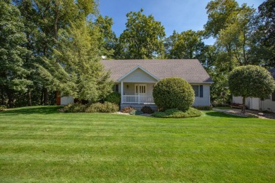 This charming 3 BD 3 BA 2,460-sq-ft home overlooks the west side - Lake Home For Sale in Jones, Michigan