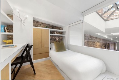 Experience luxurious loft living in this 3-Bedroom + Office - photo 12