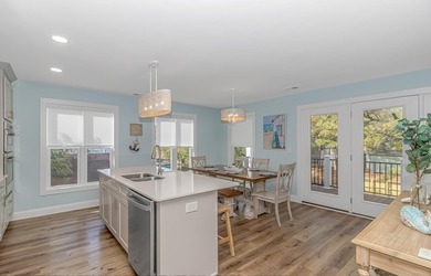 LUXURY at the BEACH!!! This LAKE FRONT 4 bedroom 3.5 bath raised - photo 5
