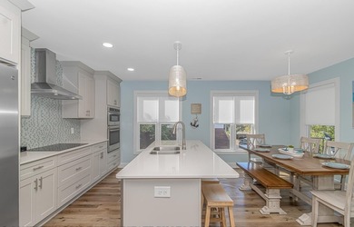 LUXURY at the BEACH!!! This LAKE FRONT 4 bedroom 3.5 bath raised - photo 6