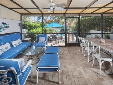 Tucked within the intimate Isla Mar community in the heart of - photo 4