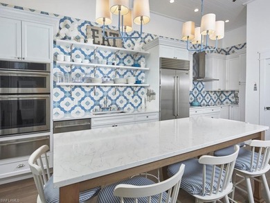 Tucked within the intimate Isla Mar community in the heart of - photo 8