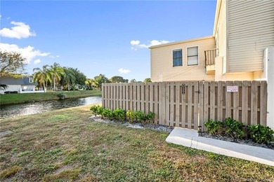Lake Wellington Townhome/Townhouse Active Under Contract in Wellington Florida