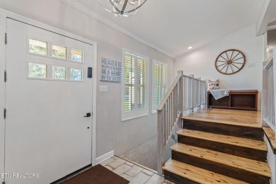 This stunning 4-bedroom, 4-bath tri-level home sits on one of - photo 5