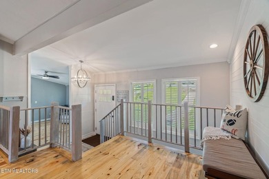 This stunning 4-bedroom, 4-bath tri-level home sits on one of - photo 6