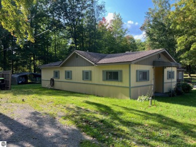 Lake Home For Sale in Lake George, Michigan