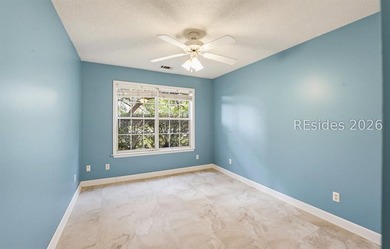 Set on a quiet street, 27 Telfair Drive offers a rare chance to - photo 18