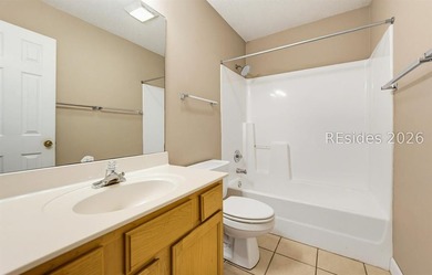 Set on a quiet street, 27 Telfair Drive offers a rare chance to - photo 24