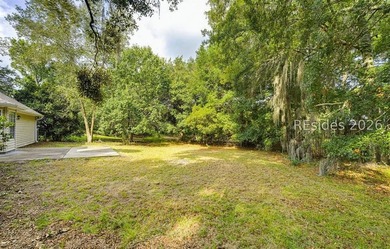Set on a quiet street, 27 Telfair Drive offers a rare chance to - photo 35