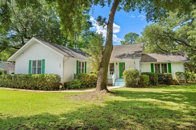 Nestled on a large, shaded 0.48-acre corner lot in the heart of - photo 1