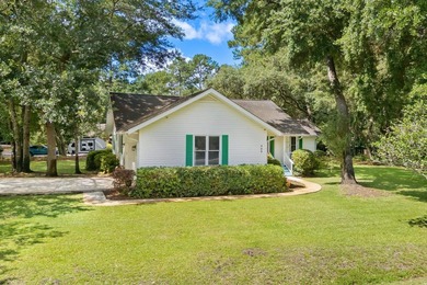 Nestled on a large, shaded 0.48-acre corner lot in the heart of - photo 2