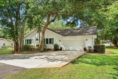 Nestled on a large, shaded 0.48-acre corner lot in the heart of - photo 3