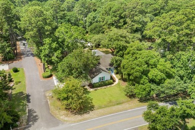 Nestled on a large, shaded 0.48-acre corner lot in the heart of - photo 4