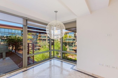 Welcome to a Rare Sky Bridge Residence at Optima Camelview