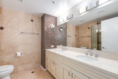 Welcome to a Rare Sky Bridge Residence at Optima Camelview