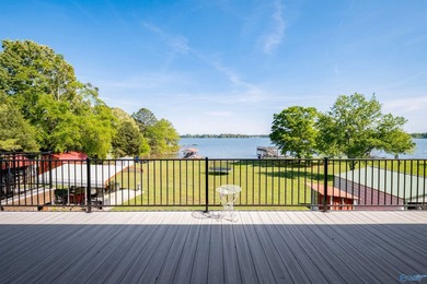 Waterfront living at its best! This striking brick 3-level home - photo 4