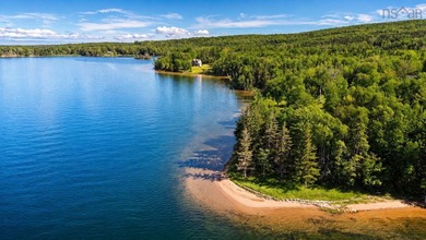 Welcome to an extraordinary turnkey waterfront retreat, where - photo 3