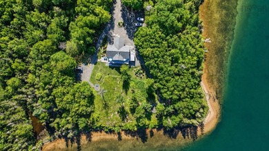 Welcome to an extraordinary turnkey waterfront retreat, where - photo 4