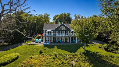 Welcome to an extraordinary turnkey waterfront retreat, where - photo 7