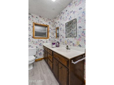 Welcome home to this solid 3-bedroom, 2.5-bath brick home - photo 26