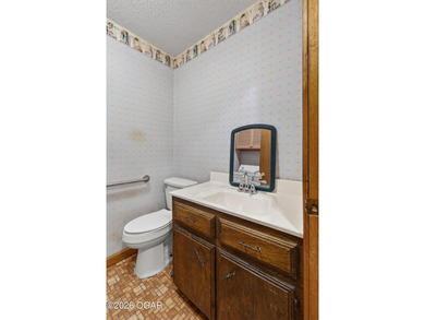 Welcome home to this solid 3-bedroom, 2.5-bath brick home - photo 31