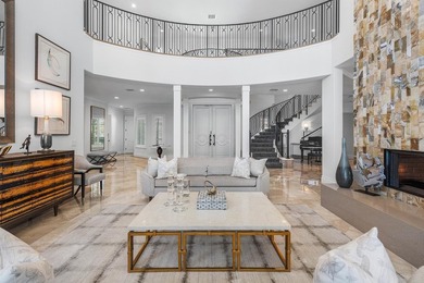 Beyond the gates of a private motor court, this six-bedroom golf - photo 5