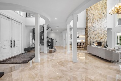 Beyond the gates of a private motor court, this six-bedroom golf - photo 6