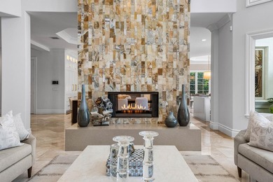 Beyond the gates of a private motor court, this six-bedroom golf - photo 9