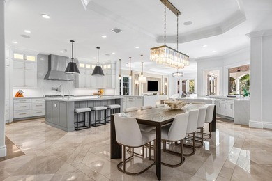 Beyond the gates of a private motor court, this six-bedroom golf - photo 10
