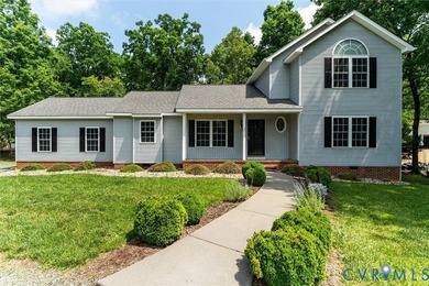 Don't miss this beautifully maintained home in Lake Monticello! - photo 1