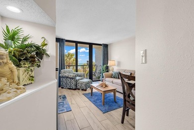 Welcome to Unit 207 at Beach Colony Resort, a charming 1-bedroom - photo 11
