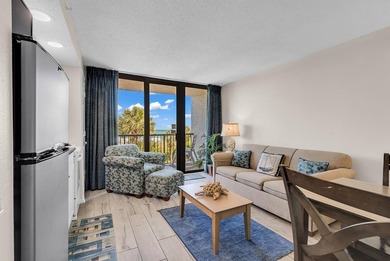 Welcome to Unit 207 at Beach Colony Resort, a charming 1-bedroom - photo 12