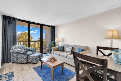 Welcome to Unit 207 at Beach Colony Resort, a charming 1-bedroom - photo 14