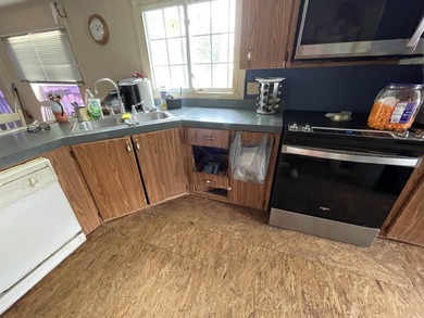 A Fixer Upper with lots of Potiential!! An ideal situation for - photo 5