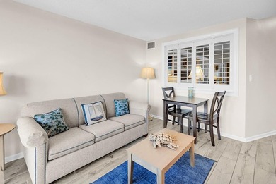 Welcome to Unit 207 at Beach Colony Resort, a charming 1-bedroom - photo 16