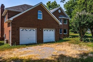 Stunning brick home built on 2 waterfront lots, in a premier - photo 6